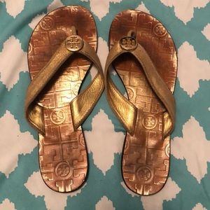 Tory Burch gold flip flops